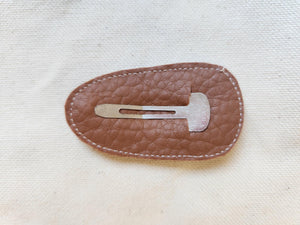 Faux leather barrettes with STS stitching